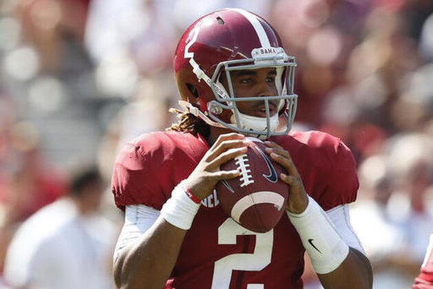 Alabama quarterback Jalen Hurts sets back to pass during the first half of an NCAA college football game against Western Kentucky, Saturday, Sept. 10, 2016, in Tuscaloosa, Ala. (AP Photo/Brynn Anderson)