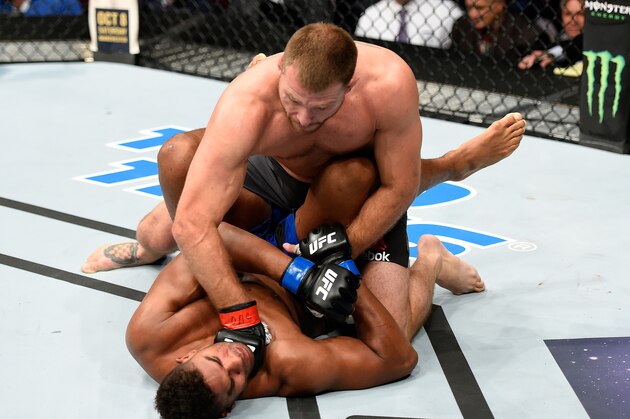 CLEVELAND, OH - SEPTEMBER 10:  Stipe Miocic (top) punches Alistair Overeem of The Netherlands in their UFC heavyweight championship bout during the UFC 203 event at Quicken Loans Arena on September 10, 2016 in Cleveland, Ohio. (Photo by Josh Hedges/Zuffa LLC/Zuffa LLC via Getty Images)