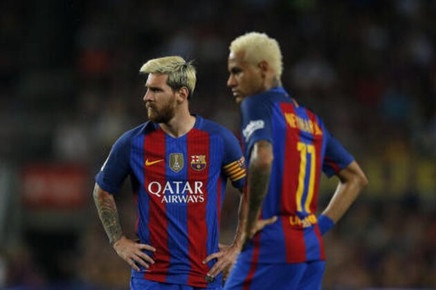 FC Barcelona's Lionel Messi, left, and Neymar look on during the Spanish La Liga soccer match between FC Barcelona and Alaves at the Camp Nou in Barcelona, Spain, Saturday, Sept. 10, 2016. (AP Photo/Manu Fernandez)