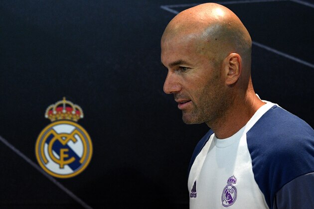 Real Madrid's French coach Zinedine Zidane arrives for a press conference at Valdebebas training ground in Madrid on September  9, 2016, on the eve of the Spanish League match Real Madrid CF vs Osasuna. / AFP / GERARD JULIEN        (Photo credit should read GERARD JULIEN/AFP/Getty Images)