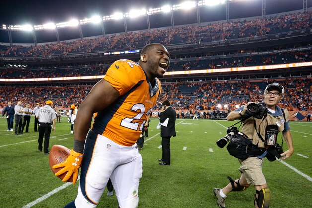 Sep 8, 2016; Denver, CO, USA; Denver Broncos running back C.J. Anderson (22) celebrates following the game against the Carolina Panthers at Sports Authority Field at Mile High. Mandatory Credit: Isaiah J. Downing-USA TODAY Sports