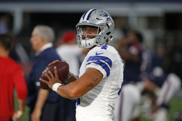 Dallas Cowboys quarterback Dak Prescott throws during warm ups before taking on the Houston Texans in a preseason NFL football game, Thursday, Sept. 1, 2016, in Arlington, Texas. (AP Photo/Ron Jenkins)