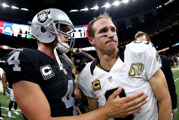 NEW ORLEANS, LA - SEPTEMBER 11:  Drew Brees #9 of the New Orleans Saints congratulates Derek Carr #4 of the Oakland Raiders after the Raiders defeated the Saints 35-34 at the Mercedes-Benz Superdome on September 11, 2016 in New Orleans, Louisiana.  (Photo by Sean Gardner/Getty Images)