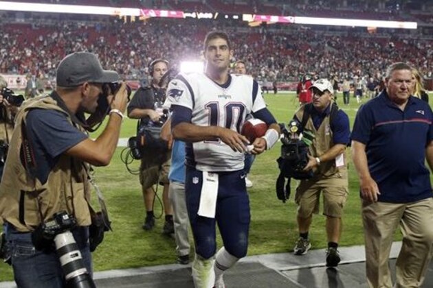 New England Patriots quarterback Jimmy Garoppolo (10) leaves the field after an NFL football game against the Arizona Cardinals, Sunday, Sept. 11, 2016, in Glendale, Ariz. The Patrios won 23-21. (AP Photo/Ross D. Franklin)