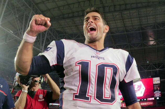Sep 11, 2016; Glendale, AZ, USA;  New England Patriots quarterback Jimmy Garoppolo (10) celebrates after beating the Arizona Cardinals 23-21 at University of Phoenix Stadium. Mandatory Credit: Matt Kartozian-USA TODAY Sports