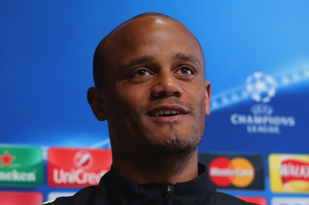 MANCHESTER, ENGLAND - APRIL 25:  Vincent Kompany speaks during a Manchester City press conference on the eve of their UEFA Champions League semi final first leg match against Real Madrid at the Academy training ground on April 25, 2016 in Manchester, United Kingdom.  (Photo by Dave Thompson/Getty Images)