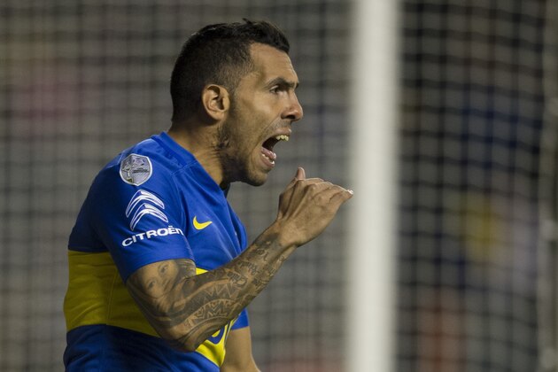 Argentina's Boca Juniors forward Carlos Tevez reacts during the Libertadores Cup quarterfinals second leg football match against Uruguay's Nacional at the 'Bombonera' stadium in Buenos Aires, on May 19, 2016. / AFP / EITAN ABRAMOVICH        (Photo credit should read EITAN ABRAMOVICH/AFP/Getty Images)