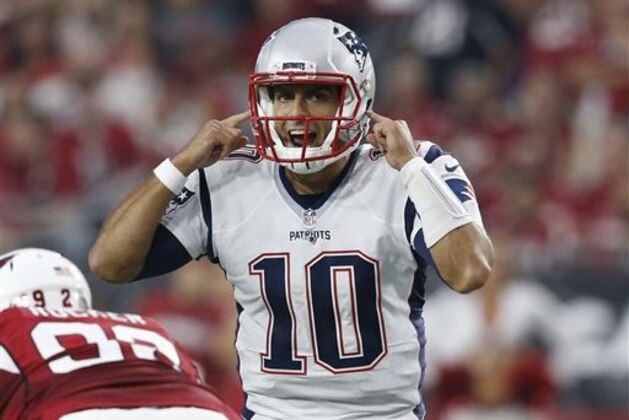 New England Patriots quarterback Jimmy Garoppolo (10) makes a call against the Arizona Cardinals during an NFL football game, Sunday, Sept. 11, 2016, in Glendale, Ariz. (AP Photo/Ross D. Franklin)