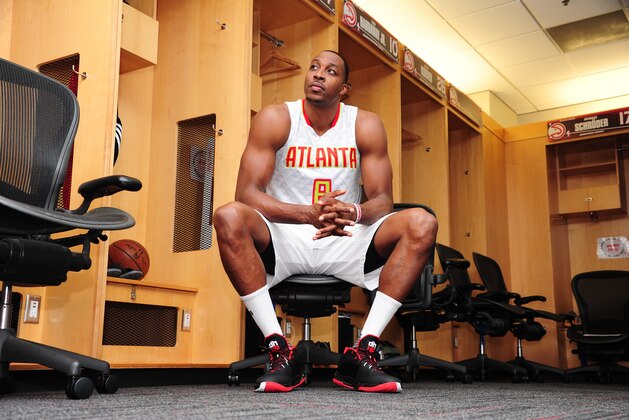 ATLANTA, GA - JULY 14:  Dwight Howard #8 of the Atlanta Hawks poses for a photo on July 14, 2016 at Philips Arena in Atlanta, Georgia.  NOTE TO USER: User expressly acknowledges and agrees that, by downloading and or using this Photograph, user is consenting to the terms and conditions of the Getty Images License Agreement. Mandatory Copyright Notice: Copyright 2016 NBAE  (Photo by Scott Cunningham/NBAE via Getty Images)