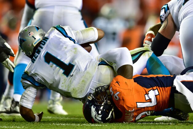 DENVER, CO - SEPTEMBER 8:  Quarterback Cam Newton #1 of the Carolina Panthers is sacked by outside linebacker DeMarcus Ware #94 of the Denver Broncos in the third quarter of a game at Sports Authority Field at Mile High on September 8, 2016 in Denver, Colorado. (Photo by Dustin Bradford/Getty Images)
