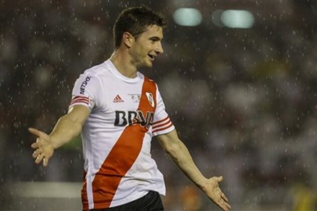 Lucas Alario of Argentina's River Plate celebrates scoring against Mexico's Tigres during the Copa Libertadores final soccer match in Buenos Aires, Argentina, Wednesday, Aug. 5, 2015.(AP Photo/Ivan Fernandez)