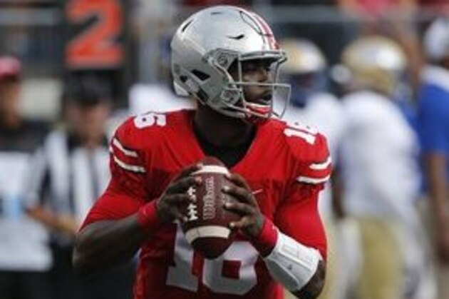Ohio State quarterback J.T. Barrett plays against Tulsa during the first half of an NCAA college football game Saturday, Sept. 10, 2016, in Columbus, Ohio. (AP Photo/Jay LaPrete)