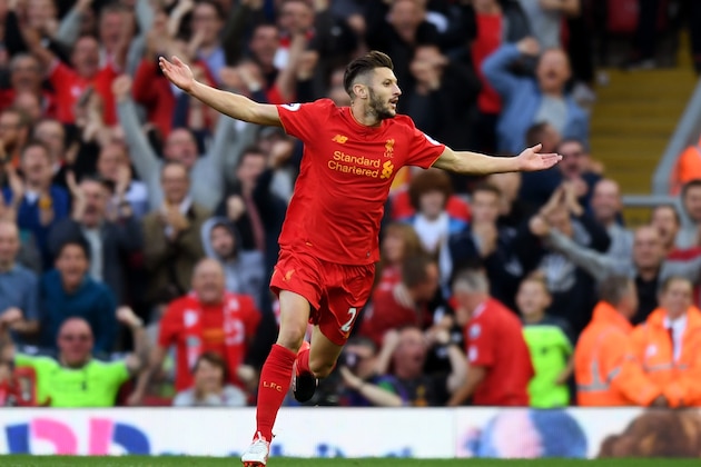 LIVERPOOL, ENGLAND - SEPTEMBER 10: Adam Lallana of Liverpool celebrates scoring his sides third goal during the Premier League match between Liverpool and Leicester City at Anfield on September 10, 2016 in Liverpool, England.  (Photo by Michael Regan/Getty Images)