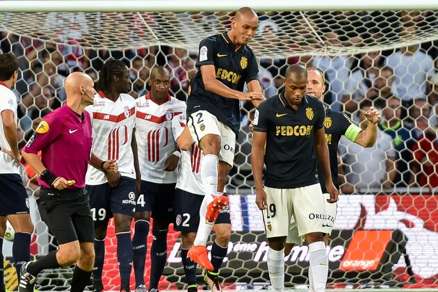 Monaco's French defender Djibril Sidibe (2R) is congratuled by his team mates after scoring a goal during the French L1 football match between Lille OSC (LOSC) and AS Monaco FC (ASMFC) at the Pierre-Mauroy Stadium in Villeneuve d'Ascq, near Lille, northern France, on September 10, 2016. / AFP / PHILIPPE HUGUEN        (Photo credit should read PHILIPPE HUGUEN/AFP/Getty Images)
