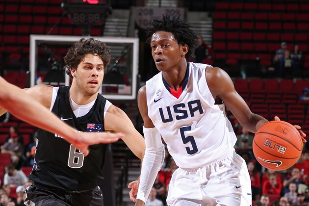 PORTLAND, OR - APRIL 9:  De'Aaron Fox #5 of the USA Junior Select Team dribbles the ball against the World Select Team during the 2016 Nike Hoop Summit on April 9, 2016 at the MODA Center Arena in Portland, Oregon. NOTE TO USER: User expressly acknowledges and agrees that, by downloading and or using this photograph, User is consenting to the terms and conditions of the Getty Images License Agreement. Mandatory Copyright Notice: Copyright 2016 NBAE (Photo by Sam Forencich/NBAE via Getty Images)