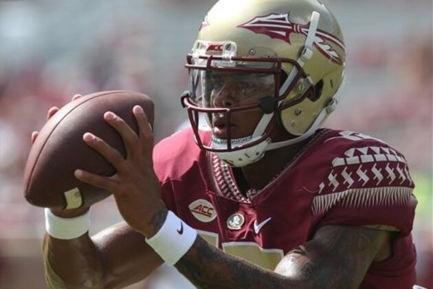 Florida State quarterback Deondre Francois concentrates on taking a snap during practice before the start of an NCAA college football game with Charleston Southern, Saturday, Sept. 10, 2016, in Tallahassee, Fla. Florida State won the game 52-8. (AP Photo/Steve Cannon)