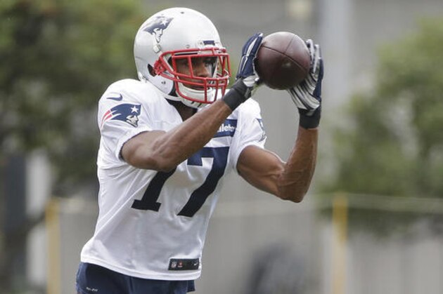 CORRECTS ID TO DEVIN STREET NOT AARON DOBSON New England Patriots' Devin Street (17) catches a pass during an NFL football practice, Wednesday, Sept. 7, 2016, in Foxborough, Mass. (AP Photo/Steven Senne)