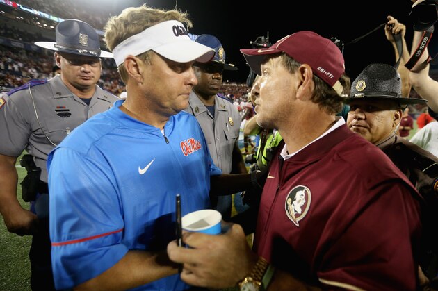 ORLANDO, FL - SEPTEMBER 05:  (L-R) Head coach Hugh Freeze of the Mississippi Rebels and head coach Jimbo Fisher of the Florida State Seminoles talk after their game in the Camping World Kickoff at Camping World Stadium on September 5, 2016 in Orlando, Florida.  (Photo by Streeter Lecka/Getty Images)