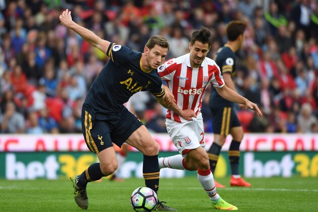 STOKE ON TRENT, ENGLAND - SEPTEMBER 10:  Jan Vertonghen of Tottenham Hotspur holds off Stephen Ireland of Stoke City during the Premier League match between Stoke City and Tottenham Hotspur at Britannia Stadium on September 10, 2016 in Stoke on Trent, England.  (Photo by Ross Kinnaird/Getty Images)