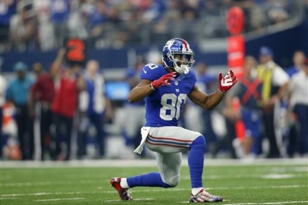 New York Giants wide receiver Victor Cruz (80) celebrates catching a pass for a first down during an NFL football game against the Dallas Cowboys on Sunday Sept. 11,  2016, in Arlington, Texas. (AP Photo/Roger Steinman)