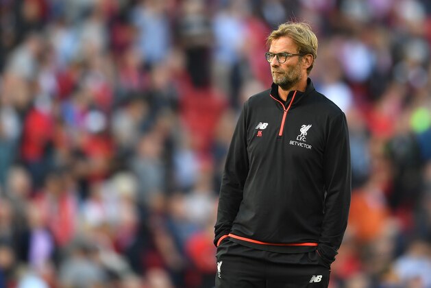 LIVERPOOL, ENGLAND - SEPTEMBER 10:  Jurgen Klopp, Manager of Liverpool looks on while his team warm up during the Premier League match between Liverpool and Leicester City at Anfield on September 10, 2016 in Liverpool, England.  (Photo by Michael Regan/Getty Images)