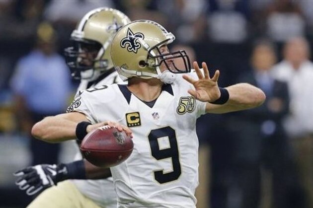 New Orleans Saints quarterback Drew Brees (9) drops back to pass in the first half of an NFL football game against the Oakland Raiders in New Orleans, Sunday, Sept. 11, 2016. (AP Photo/Butch Dill)