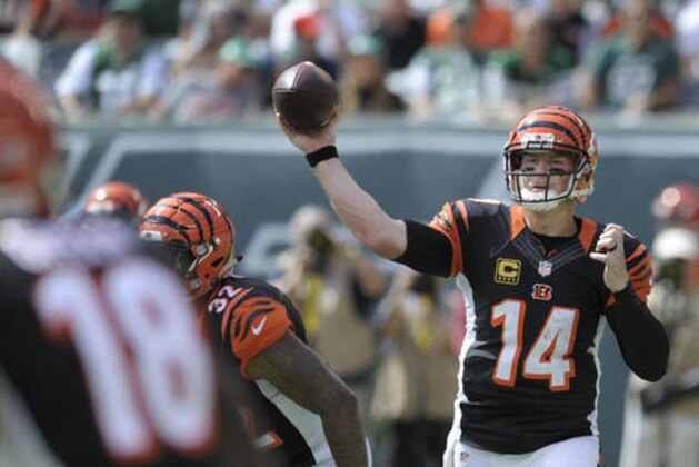 Cincinnati Bengals quarterback Andy Dalton (14) throws a pass to A.J. Green (18) during the first half of an NFL football game against the New York Jets Sunday, Sept. 11, 2016 in East Rutherford, N.J. (AP Photo/Bill Kostroun)