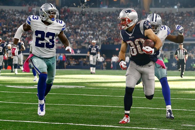 ARLINGTON, TX - OCTOBER 11:  Danny Amendola #80 of the New England Patriots carries the ball after the catch as Corey White #23 of the Dallas Cowboys and Byron Jones #31 of the Dallas Cowboys try to make the tackle during the NFL game at AT&T Stadium on October 11, 2015 in Arlington, Texas.  (Photo by Mike Stone/Getty Images)