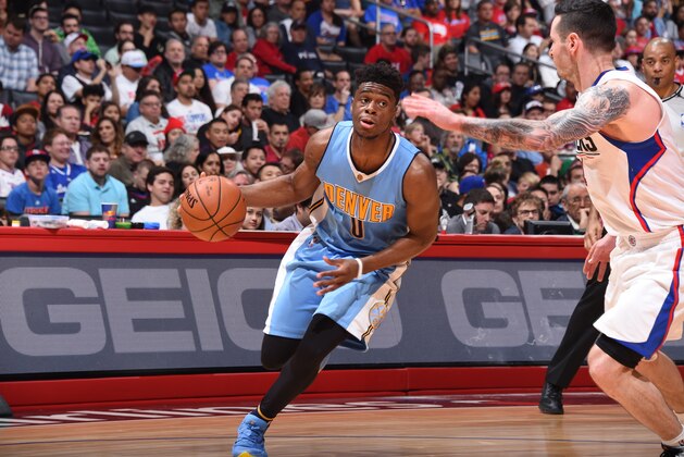 LOS ANGELES, CA - MARCH 27:  Emmanuel Mudiay #0 of the Denver Nuggets handles the ball against the Los Angeles Clippers on March 27, 2016 at STAPLES Center in Los Angeles, California. NOTE TO USER: User expressly acknowledges and agrees that, by downloading and/or using this Photograph, user is consenting to the terms and conditions of the Getty Images License Agreement. Mandatory Copyright Notice: Copyright 2016 NBAE (Photo by Andrew D. Bernstein/NBAE via Getty Images)