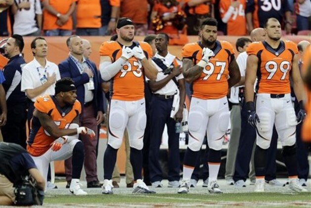 Denver Broncos inside linebacker Brandon Marshall (54) kneels during the National Anthem prior to an NFL football game against the Carolina Panthers, Thursday, Sept. 8, 2016, in Denver. (AP Photo/Joe Mahoney)