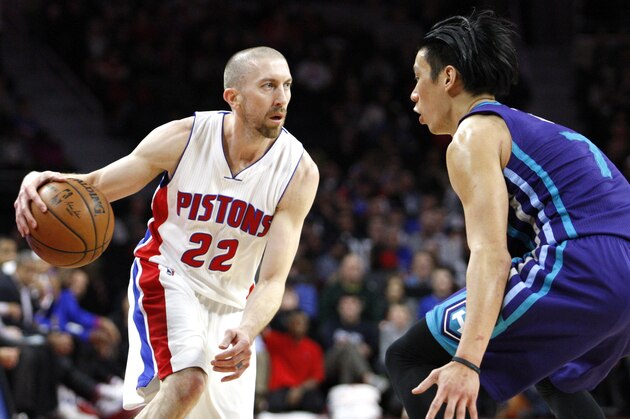 Mar 25, 2016; Auburn Hills, MI, USA; Detroit Pistons guard Steve Blake (22) dribbles the all as Charlotte Hornets guard Jeremy Lin (7) defends during the fourth quarter at The Palace of Auburn Hills. The Pistons won 112-105. Mandatory Credit: Raj Mehta-USA TODAY Sports