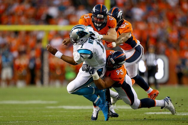 DENVER, CO - SEPTEMBER 08:  Quarterback Cam Newton #1 of the Carolina Panthers is hit by defensive end Derek Wolfe #95 and defensive end Jared Crick #93 of the Denver Broncos in the first quarter at Sports Authority Field at Mile High on September 8, 2016 in Denver, Colorado.  (Photo by Justin Edmonds/Getty Images)