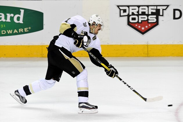 SAN JOSE, CA - JUNE 12:  Evgeni Malkin #71 of the Pittsburgh Penguins takes a shot against the San Jose Sharks in Game Six of the 2016 NHL Stanley Cup Final at SAP Center on June 12, 2016 in San Jose, California.  (Photo by Thearon W. Henderson/Getty Images)