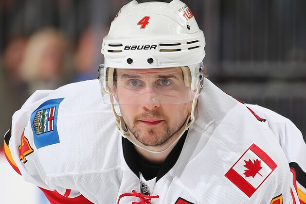 NEWARK, NJ - JANUARY 19:  Kris Russell #4 of the Calgary Flames looks on beforoe a face off against the New Jersey Devils on January 19,2016 at Prudential Center in Newark, New Jersey.  (Photo by Elsa/Getty Images)
