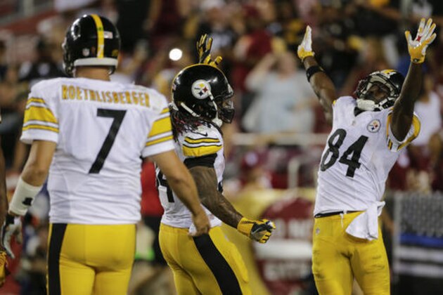 Pittsburgh Steelers running back DeAngelo Williams (34) and wide receiver Antonio Brown (84) celebrate the team's victory over the Washington Redskins as quarterback Ben Roethlisberger (7) walks past during the second half of an NFL football game in Landover, Md., Monday, Sept. 12, 2016. The Steelers defeated the Redskins 38-16. (AP Photo/Mark Tenally)