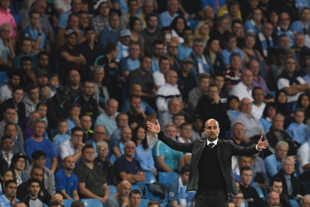 Manchester City's Spanish manager Pep Guardiola gestures on the touchline during the UEFA Champions League group C football match between Manchester City and Borussia Monchengladbach at the Etihad stadium in Manchester, northwest England, on September 14, 2016. / AFP / PAUL ELLIS        (Photo credit should read PAUL ELLIS/AFP/Getty Images)