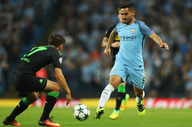 MANCHESTER, ENGLAND - SEPTEMBER 14:  Ilkay Gundogan in action with Oscar Wendt of Borussia Moenchengladbach  during the UEFA Champions League match between Manchester City FC and VfL Borussia Moenchengladbach at Etihad Stadium on September 14, 2016 in Manchester, England.  (Photo by Richard Heathcote/Getty Images)