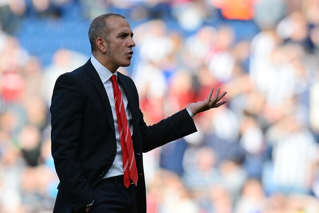Sunderland manager Paolo Di Canio reacts towards the Sunderland fans after the English Premier League football match between West Bromwich Albion and Sunderland at The Hawthorns in West Bromwich, central England, on September 21, 2013.  West Bromwich Albion won 3-0.  AFP PHOTO / ANDREW YATES

RESTRICTED TO EDITORIAL USE. No use with unauthorized audio, video, data, fixture lists, club/league logos or live services. Online in-match use limited to 45 images, no video emulation. No use in betting, games or single club/league/player publications.        (Photo credit should read ANDREW YATES/AFP/Getty Images)