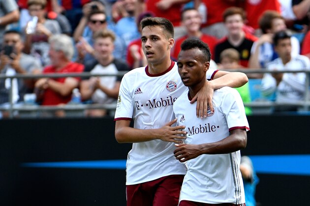 CHARLOTTE, NC - JULY 30:  Milos Pantovic #38, left, congratulates teammate Julian Green #37 of FC Bayern Munich after one of Green's goals against FC Internazionale during an International Champions Cup match at Bank of America Stadium on July 30, 2016 in Charlotte, North Carolina.  (Photo by Grant Halverson/Getty Images)