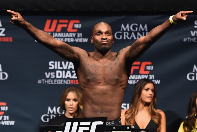 LAS VEGAS, NV - JANUARY 30:  Derek Brunson steps on the scale during the UFC 183 weigh-in at the MGM Grand Garden Arena on January 30, 2015 in Las Vegas, Nevada.  (Photo by Josh Hedges/Zuffa LLC/Zuffa LLC via Getty Images)