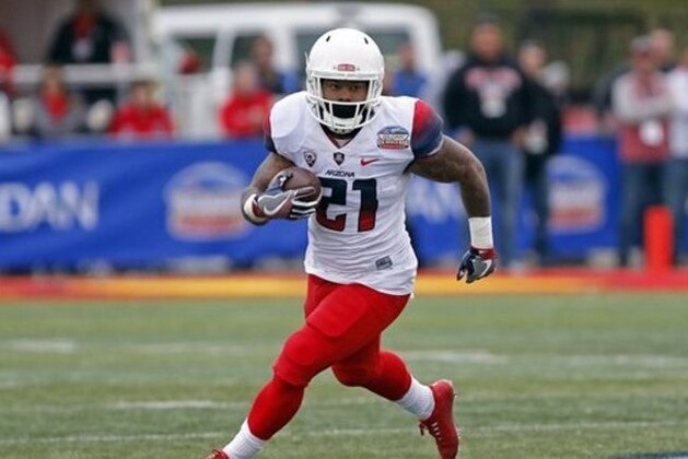Arizona running back Orlando Bradford runs for yardage during the second half of the New Mexico Bowl NCAA college football game against New Mexico in Albuquerque, N.M., Saturday, Dec. 19, 2015. (AP Photo/Andres Leighton)