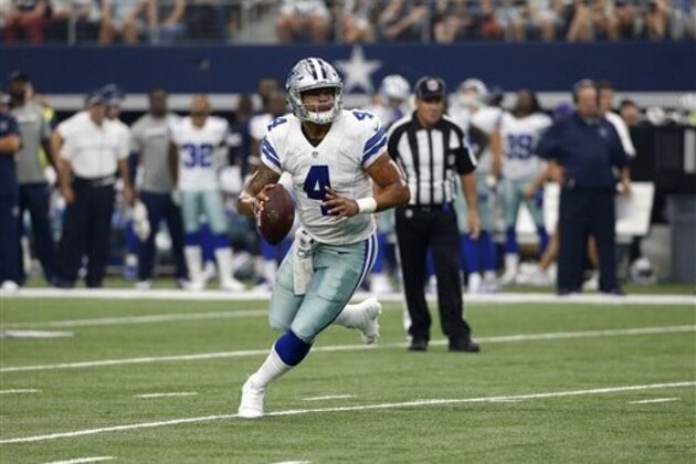Dallas Cowboys quarterback Dak Prescott (4) scrambles out of the pocket during an NFL football game against the New York Giants on Sunday, Sept. 11, 2016, in Arlington, Texas. (AP Photo/Michael Ainsworth)