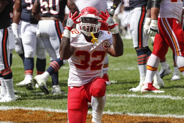 Aug 27, 2016; Chicago, IL, USA; Kansas City Chiefs running back Spencer Ware (32) celebrates after his team scored against the Chicago Bears during the first half of the preseason game at Soldier Field. Mandatory Credit: Kamil Krzaczynski-USA TODAY Sports