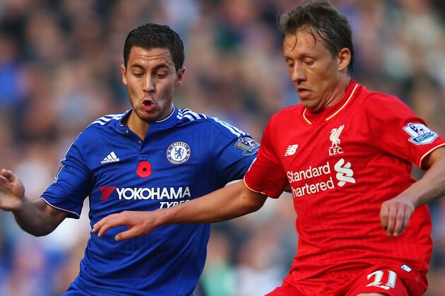LONDON, ENGLAND - OCTOBER 31:  Eden Hazard of Chelsea and Lucas Leiva of Liverpool compete for the ball during the Barclays Premier League match between Chelsea and Liverpool at Stamford Bridge on October 31, 2015 in London, England.  (Photo by Clive Rose/Getty Images)