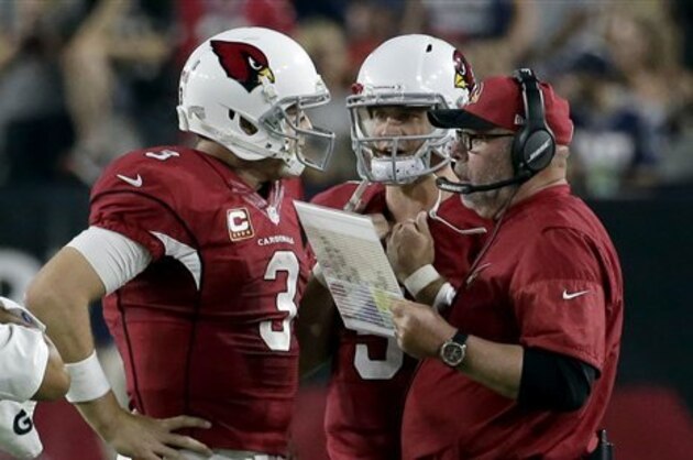 Arizona Cardinals quarterback Carson Palmer (3) talks with Arizona Cardinals head coach Bruce Arians during the second half of an NFL football game against the New England Patriots, Sunday, Sept. 11, 2016, in Glendale, Ariz. The Patriots won 23-21. (AP Photo/Rick Scuteri)