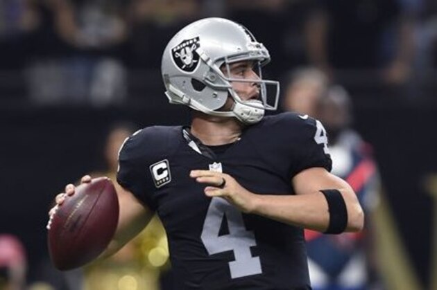 Oakland Raiders quarterback Derek Carr (4) drops back to pass in the first half of an NFL football game against the New Orleans Saints in New Orleans, Sunday, Sept. 11, 2016. (AP Photo/Bill Feig)