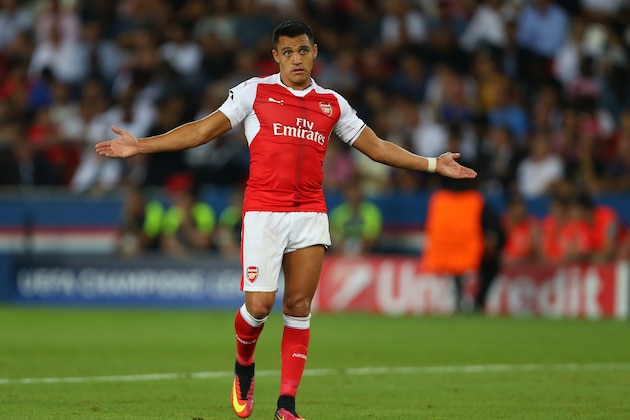 PARIS, FRANCE - SEPTEMBER 13: Alexis Sanchez of Arsenal shrugs his shoulders during the UEFA Champions League match between Paris Saint-Germain and Arsenal at Parc des Princes on September 13, 2016 in Paris, . (Photo by Catherine Ivill - AMA/Getty Images)