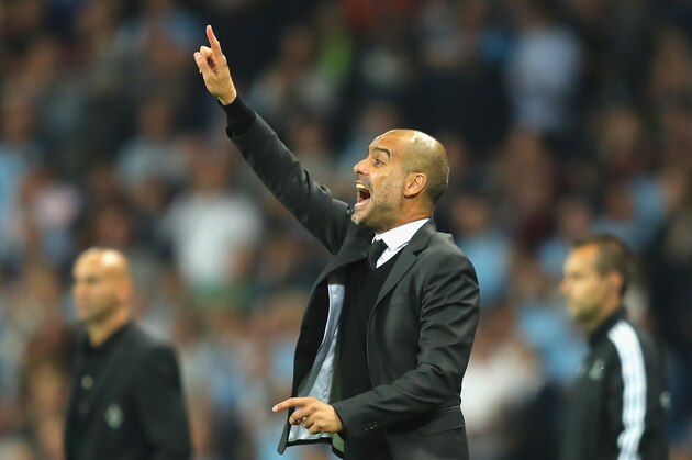MANCHESTER, ENGLAND - SEPTEMBER 14: Josep Guardiola manager of Manchester City issues instructions to his players during the UEFA Champions League match between Manchester City FC and VfL Borussia Moenchengladbach at Etihad Stadium on September 14, 2016 in Manchester, England.  (Photo by Richard Heathcote/Getty Images)