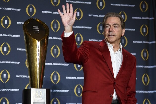 SCOTTSDALE, AZ - JANUARY 12: Head Coach Nick Saban of the Alabama Crimson Tide pose with the College Football Playoff National Championship Trophy during the MVP Press Conference after winning the College Football Playoff National Championship at the JW Marriott Camelback Inn on January 12, 2016 in Scottsdale, Arizona. (Photo by Don Juan Moore/Getty Images)