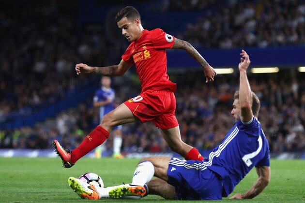 LONDON, ENGLAND - SEPTEMBER 16:  Philippe Coutinho of Liverpool is tackled by Branislav Ivanovic of Chelsea during the Premier League match between Chelsea and Liverpool at Stamford Bridge on September 16, 2016 in London, England.  (Photo by Clive Rose/Getty Images)